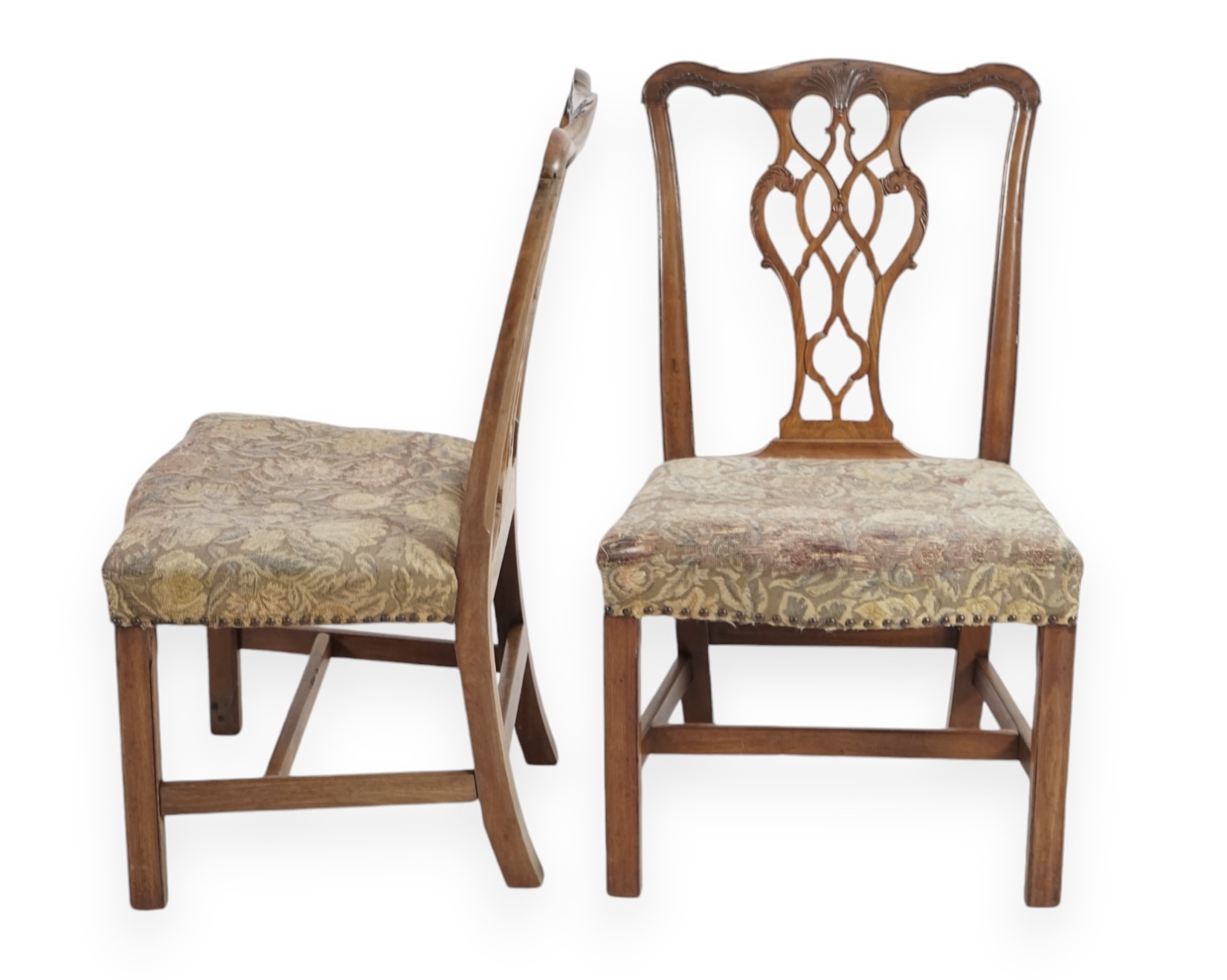 A pair of George III Chippendale style mahogany dining chairs